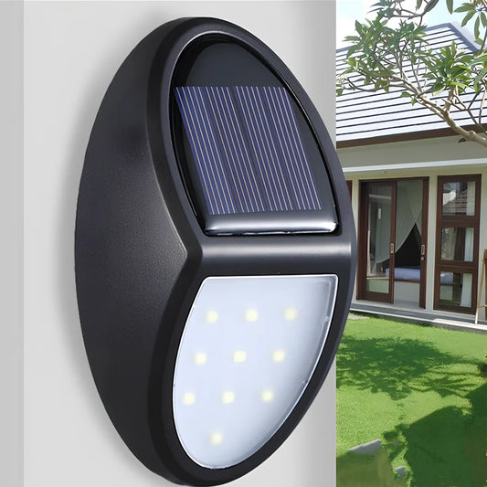 Black LED solar wall light with solar panel and 2835 lamp beads for outdoor illumination