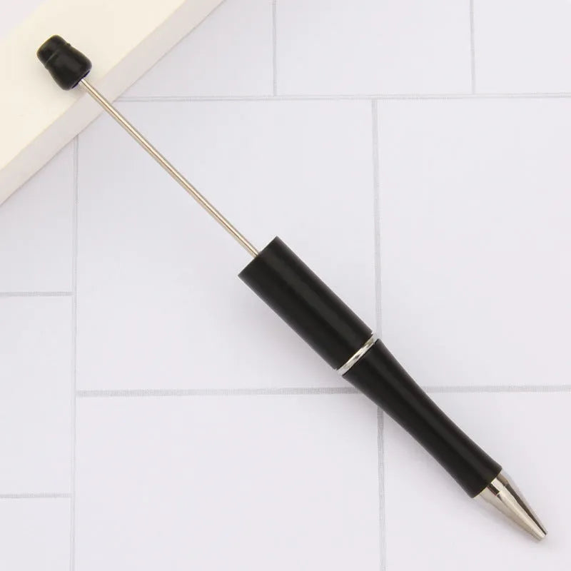 Rotating bead ballpoint pen in gradient colour with ABS plastic and steel wire construction