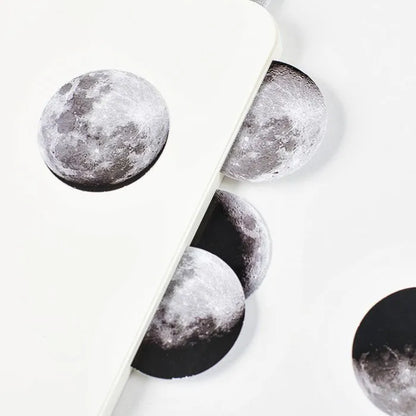 Black moon phase and calendar planet sticker set containing 45 pieces in box packaging