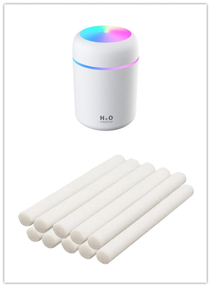 Car USB humidifier with 300ml water tank capacity and 25-35ml/h spray volume for continuous moisture without desktop wetting, featuring colourful atmosphere lights and low noise operation