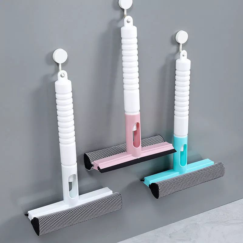 Multifunctional glass scraper squeegee in green, white, and pink for efficient cleaning