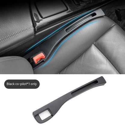 Black car seat gap storage box organiser pocket placed between vehicle seat and centre console