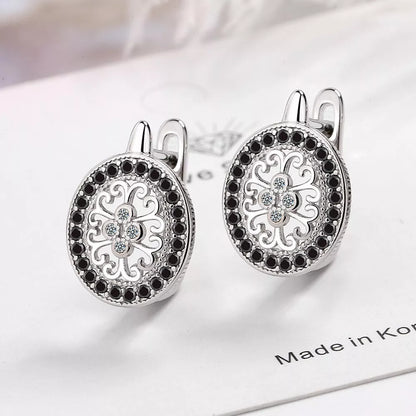 Diamond-encrusted round ear clips in copper white gold plated, geometric women's earrings