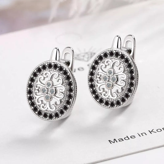 Diamond-encrusted round ear clips in copper white gold plated, geometric women's earrings