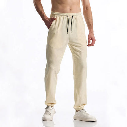 Silky rib fabric baggy straight trousers with drawstring waistband in black, white or khaki colours