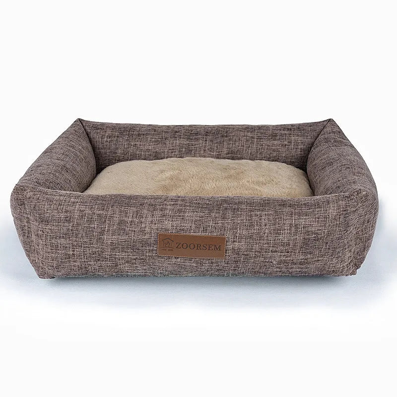 Grey linen fabric square dog bed measuring 60x50cm on a wooden floor