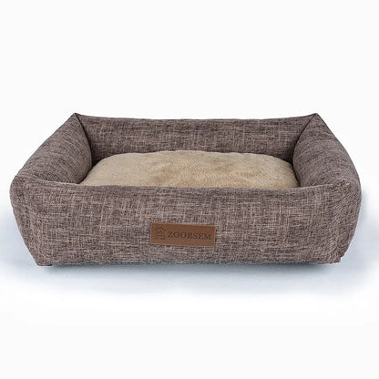Grey linen fabric square dog bed measuring 60x50cm on a wooden floor