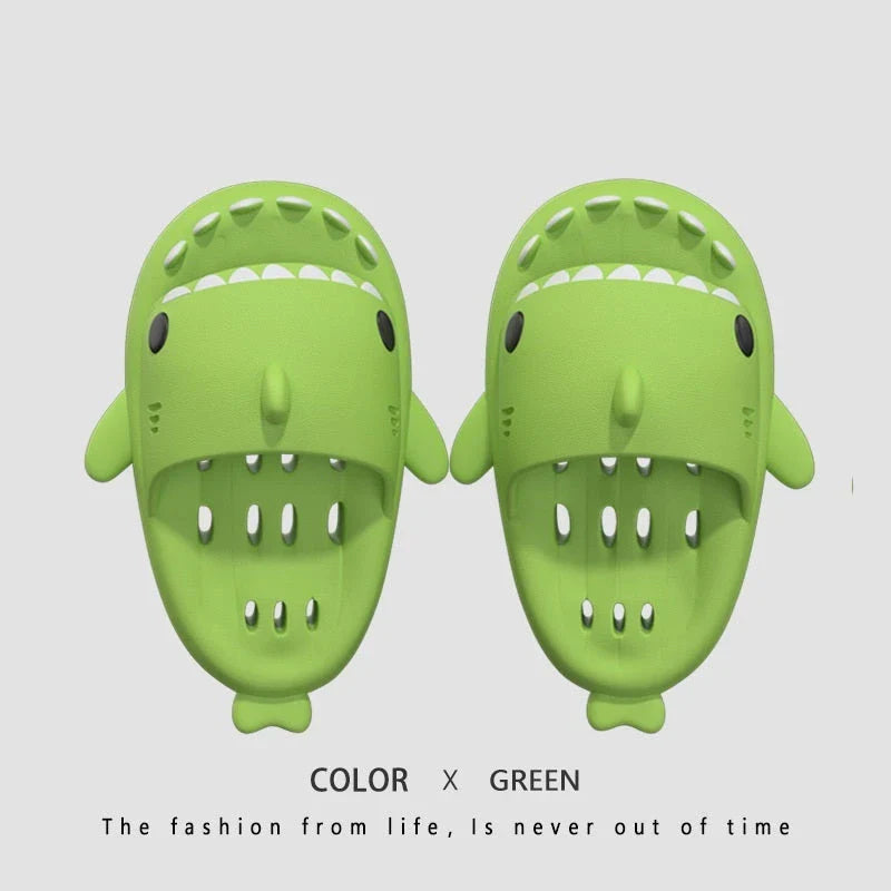 Colorful shark-themed shower slides with drainage holes, designed for comfortable and practical use in the pool or shower.