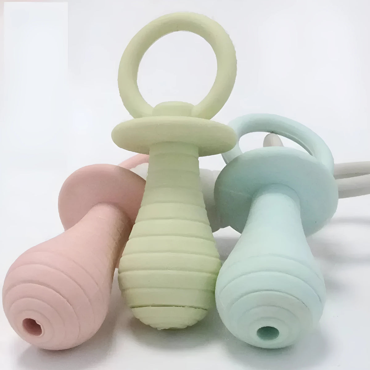 TPR rubber pet pacifier chew toys with squeaker in blue, gray, green and pink colours for dogs and cats
