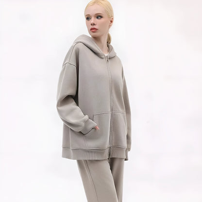 Women's fleece-lined distressed hooded cardigan sweater in loose fit with patch pockets
