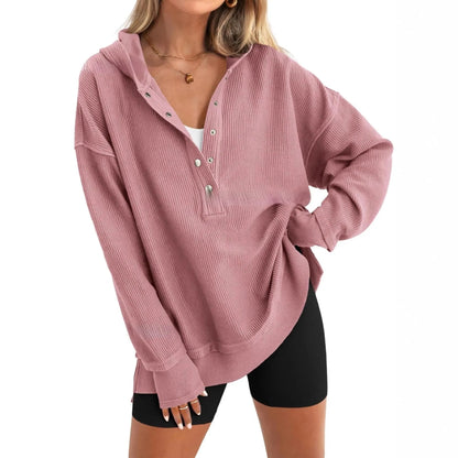 Women's loose raglan sleeve sweater in peacock green colour, showing long sleeves and casual pullover style