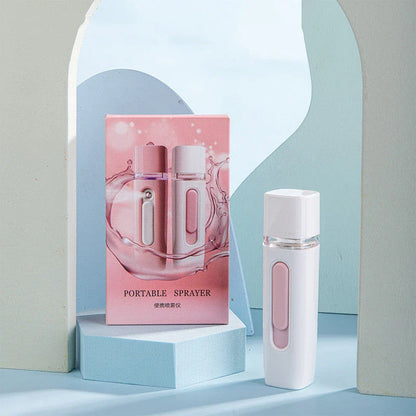 Portable facial mister with rechargeable power bank, transforms water into fine mist for skin hydration and rejuvenation