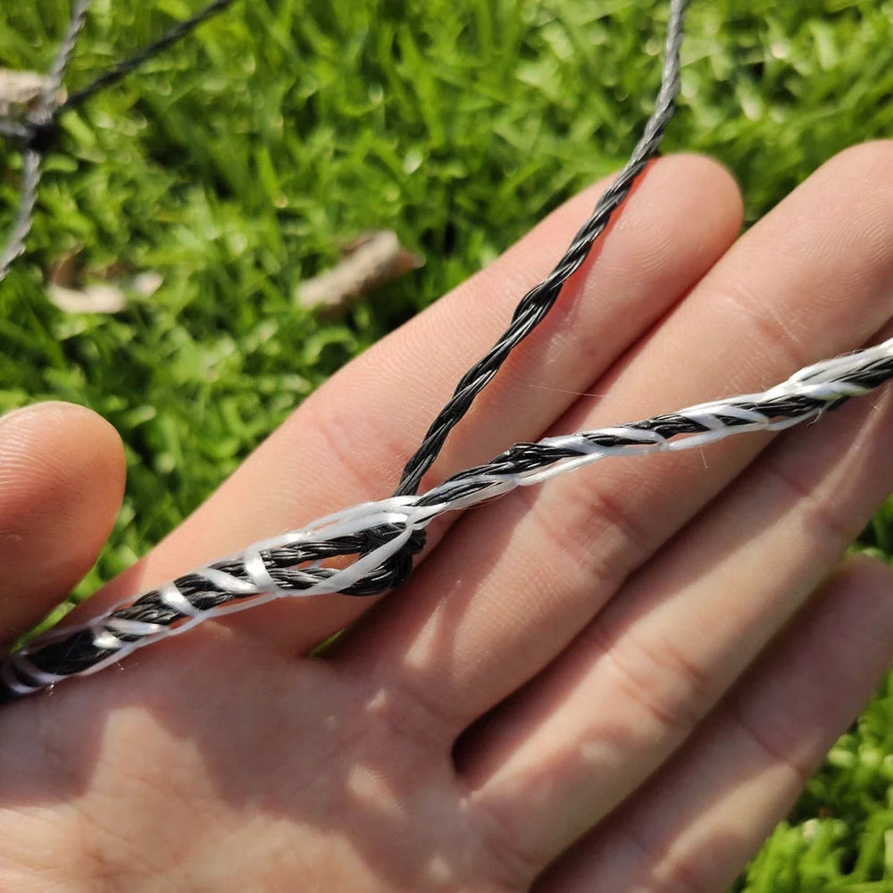 Black polyethylene volleyball net with four sides standard construction showing rope thickness detail