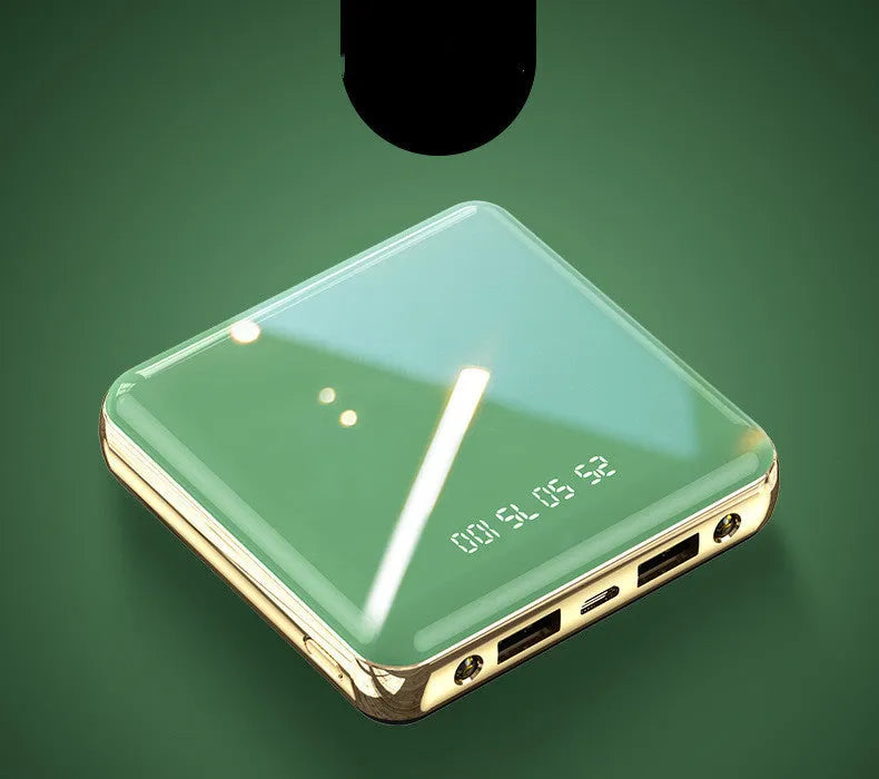 Compact blue 20000mAh mini power bank with multiple USB ports on a white background.