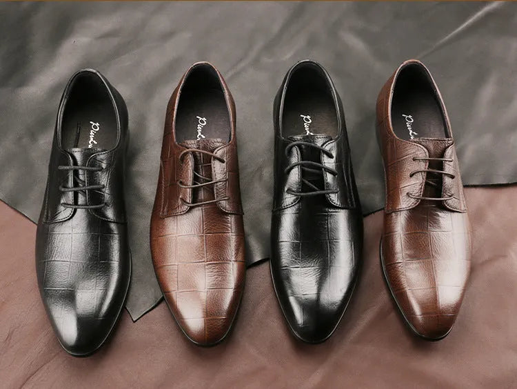 Men's black leather derby shoes with pointed toe, visible sewing details, and antiskid rubber soles