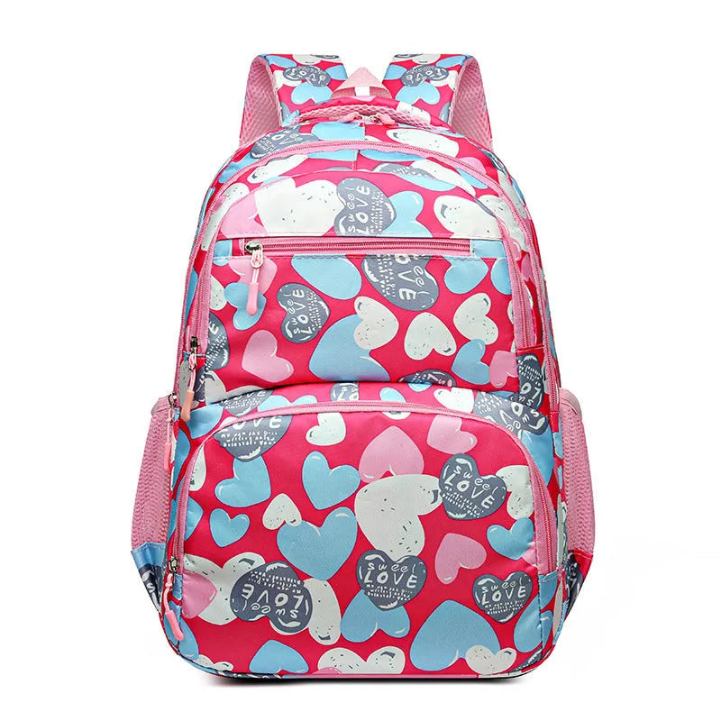 Student schoolbag with air pillow belt in blue, grey, pink, or rose red, made from Oxford cloth for burden reduction.