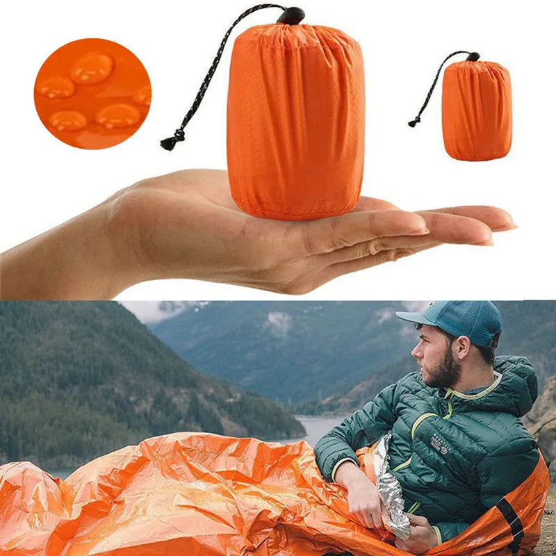Reusable emergency sleeping bag in PE, 200cm x 90cm, waterproof thermal survival bivvy for camping and outdoor use.
