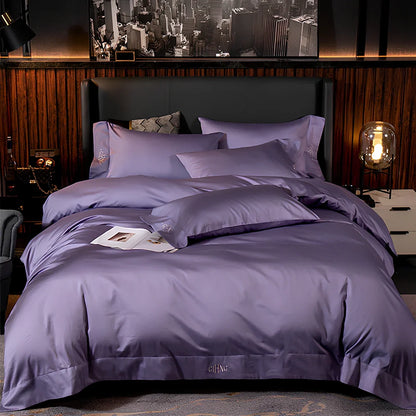 Four-piece quilted cotton bed set in royal blue, showing 200x230 cm cover and 48x74 cm pillowcases for 1.5m bed