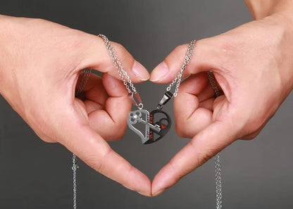 Elegant stainless steel love pendant necklace set for couples, perfect Valentine's gift.