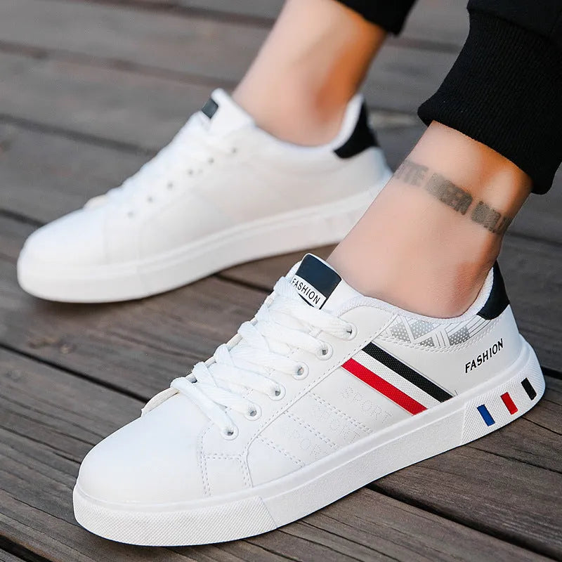 Sports shoes in black, grey, or white colours with European sizing 39-44 and foot length measurements 245-270mm