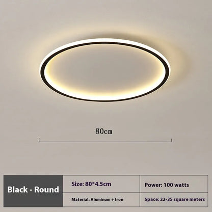 Minimalist circular ceiling lamp in gold finish mounted on a white ceiling