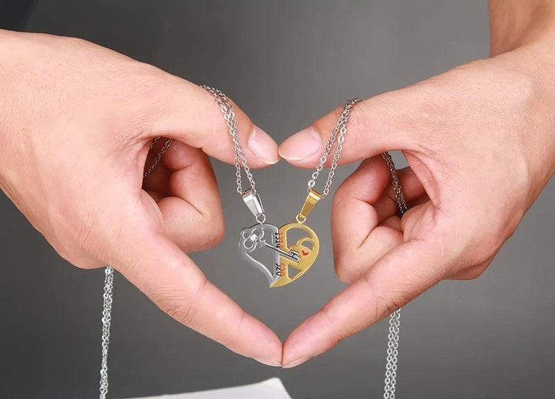 Elegant stainless steel love pendant necklace set for couples, perfect Valentine's gift.