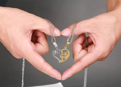 Elegant stainless steel love pendant necklace set for couples, perfect Valentine's gift.