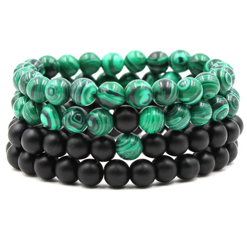 Elegant malachite stone bracelets with unique textures and patterns, perfect for a stylish accessory.