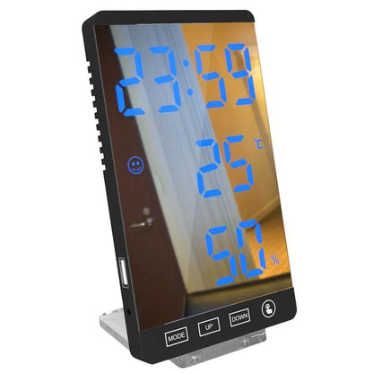 Multifunctional LED mirror alarm clock displaying time, temperature, and humidity