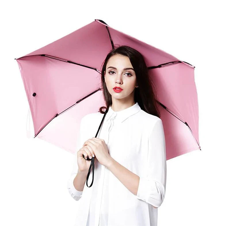 Compact and portable mini umbrella with aluminum alloy frame and polyester fabric in various vibrant colors