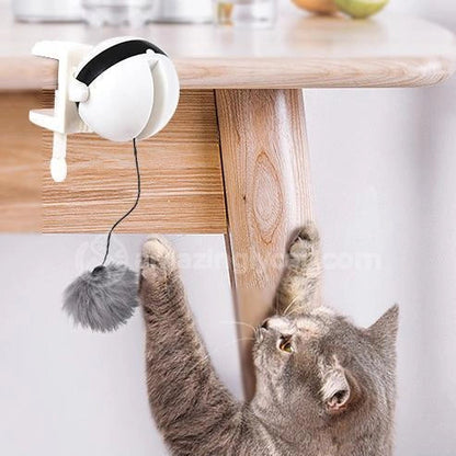 Interactive electronic motion cat toy with real fur ball for engaging playtime