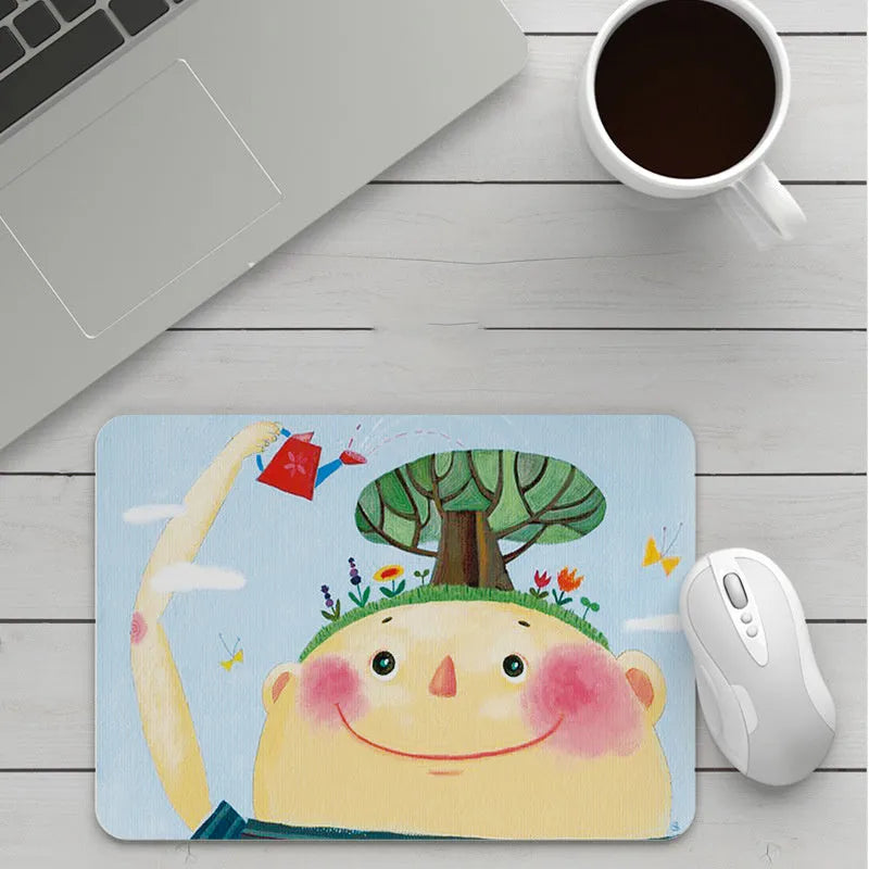 Customisable thick cartoon mouse pad with non-slip base, showing sample patterns like strawberry, cat, and whale designs.