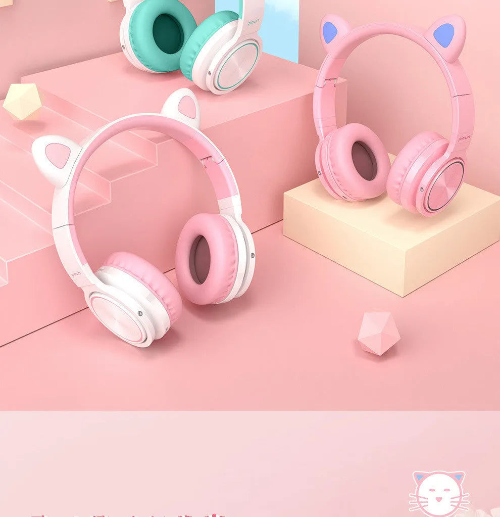 Pink and white wireless Bluetooth headset with 40mm speakers and braided cable
