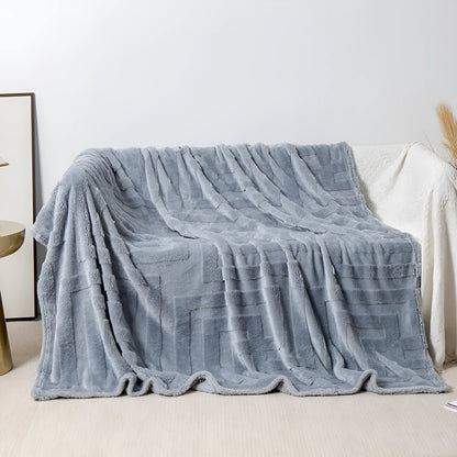Thick square coral fleece blanket in a modern style, shown in one of five colours including lake blue or khaki.