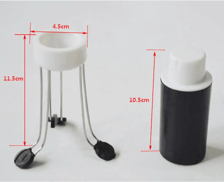 White and black wireless automatic kitchen stirrer with three-speed button, shown next to a saucepan.