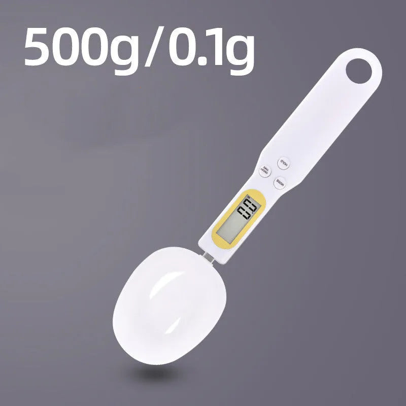 Black electronic measuring spoon scale showing digital display with spoon bowl for kitchen weighing