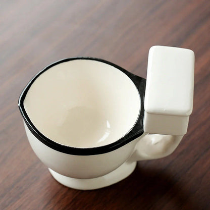 Toilet-shaped ceramic mug with handgrip, perfect for coffee or tea, 280 ml capacity