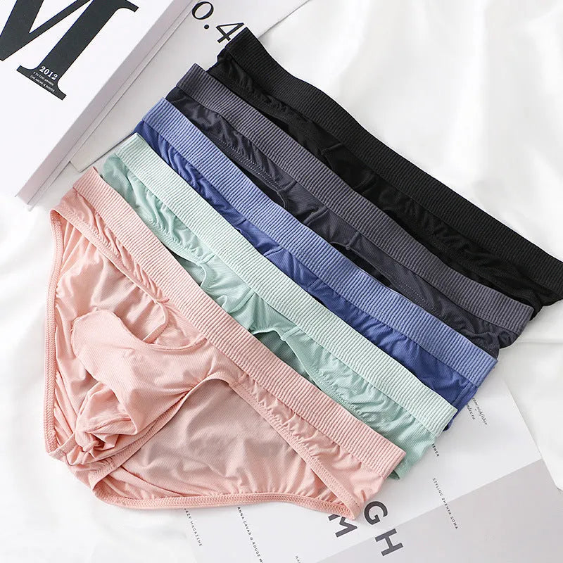 Men's low waist briefs in ice silk fabric, showing knitted weave and low waist design, available in black, gray, light green, pink, purplish blue.