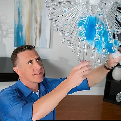 Motorised hand duster with electrostatic bristles cleaning ceiling fan blades