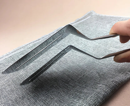 Stainless steel barbecue tongs with 32cm handles and serrated gripping surfaces