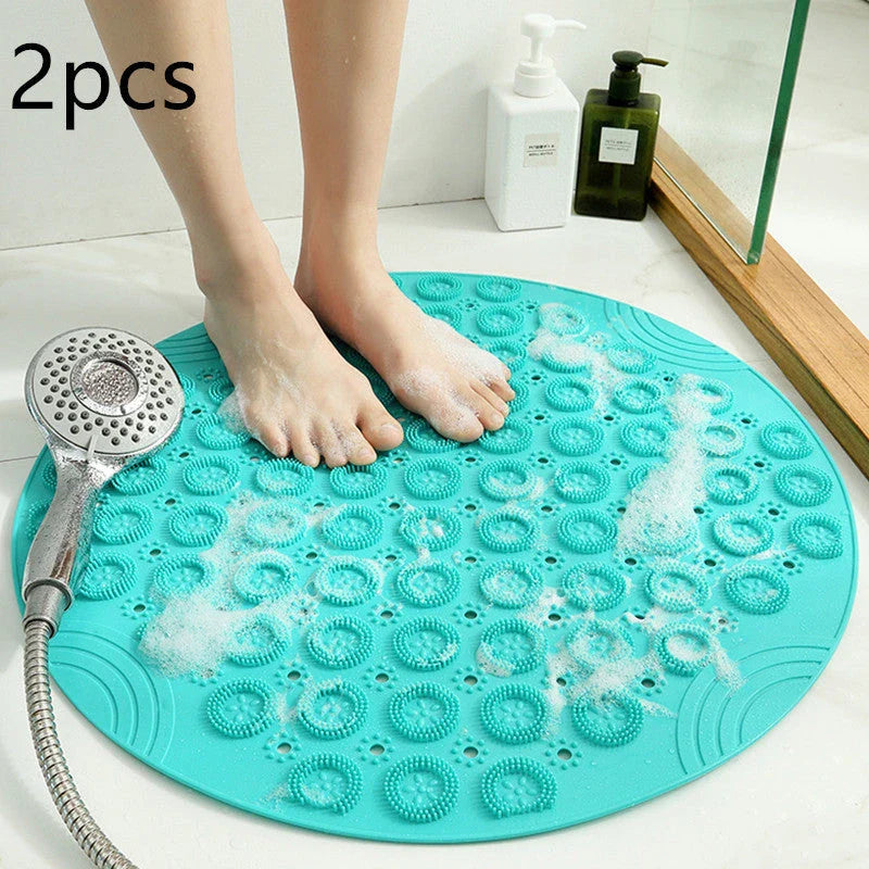 Textured round shower mat with anti-slip surface, massage nodules, and drainage holes for a comfortable and safe bathing experience