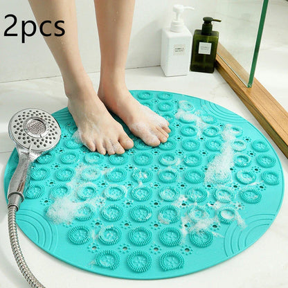 Textured round shower mat with anti-slip surface, massage nodules, and drainage holes for a comfortable and safe bathing experience