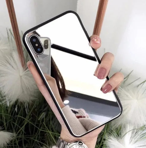 Black iPhone mirror phone case with built-in self-timer glass, compatible with iPhone 7 Plus, 8 Plus, and X models.