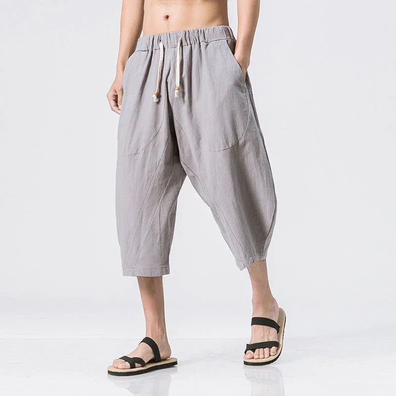 Comfy cotton harem pants in a variety of colors, featuring a relaxed, wide-leg silhouette and convenient drawstring waistband.