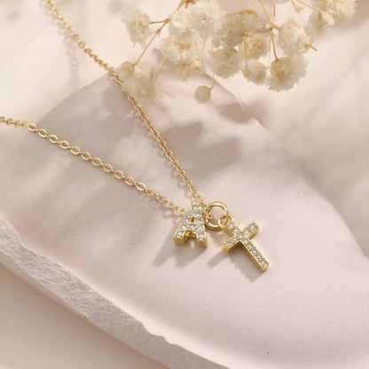 A-Z zircon inlaid letter necklace on a copper regular chain with electroplated finish
