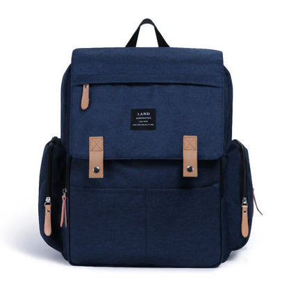 LAND Mommy large grey diaper backpack with changing mat, shown as a travel nappy bag.