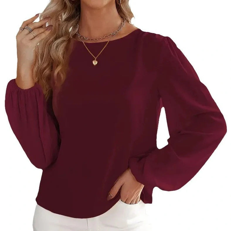 Wine red polyester long sleeve pullover top with button detailing on front, regular fit for commuting wear