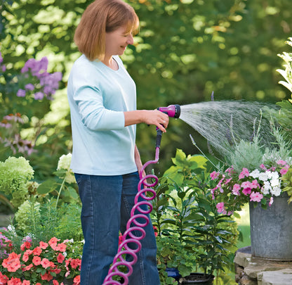 Telescopic garden hose sprinkler with ABS plastic gun head and handle, showing extended length for watering