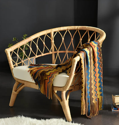 130x150cm knitted acrylic blanket with 10cm fringe detailing in beige colour draped over sofa