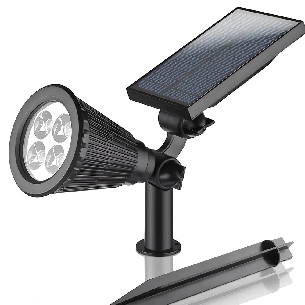 Solar lawn light with ground stake mounting, LED illumination, and waterproof housing for garden installation